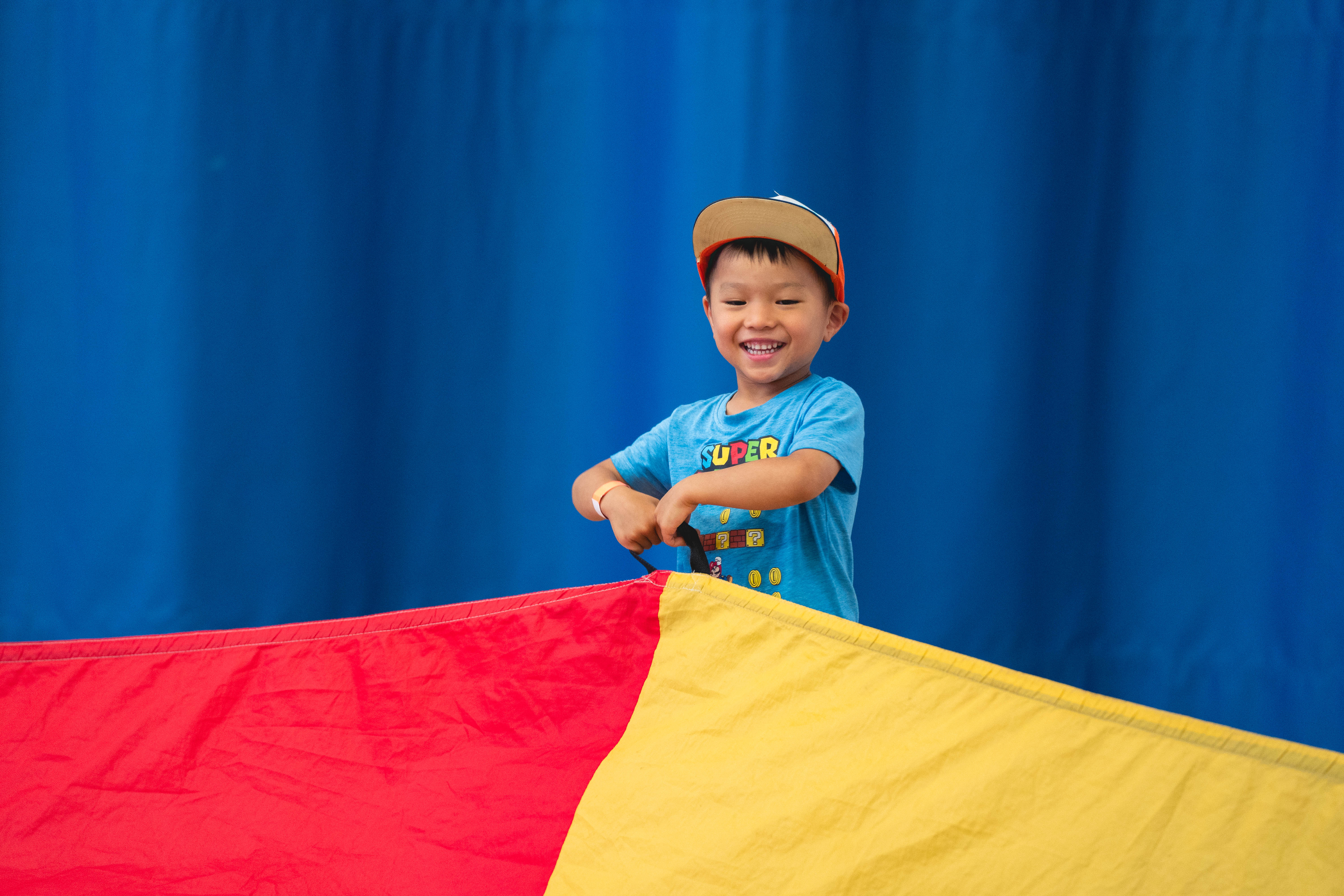 camper playing parachute