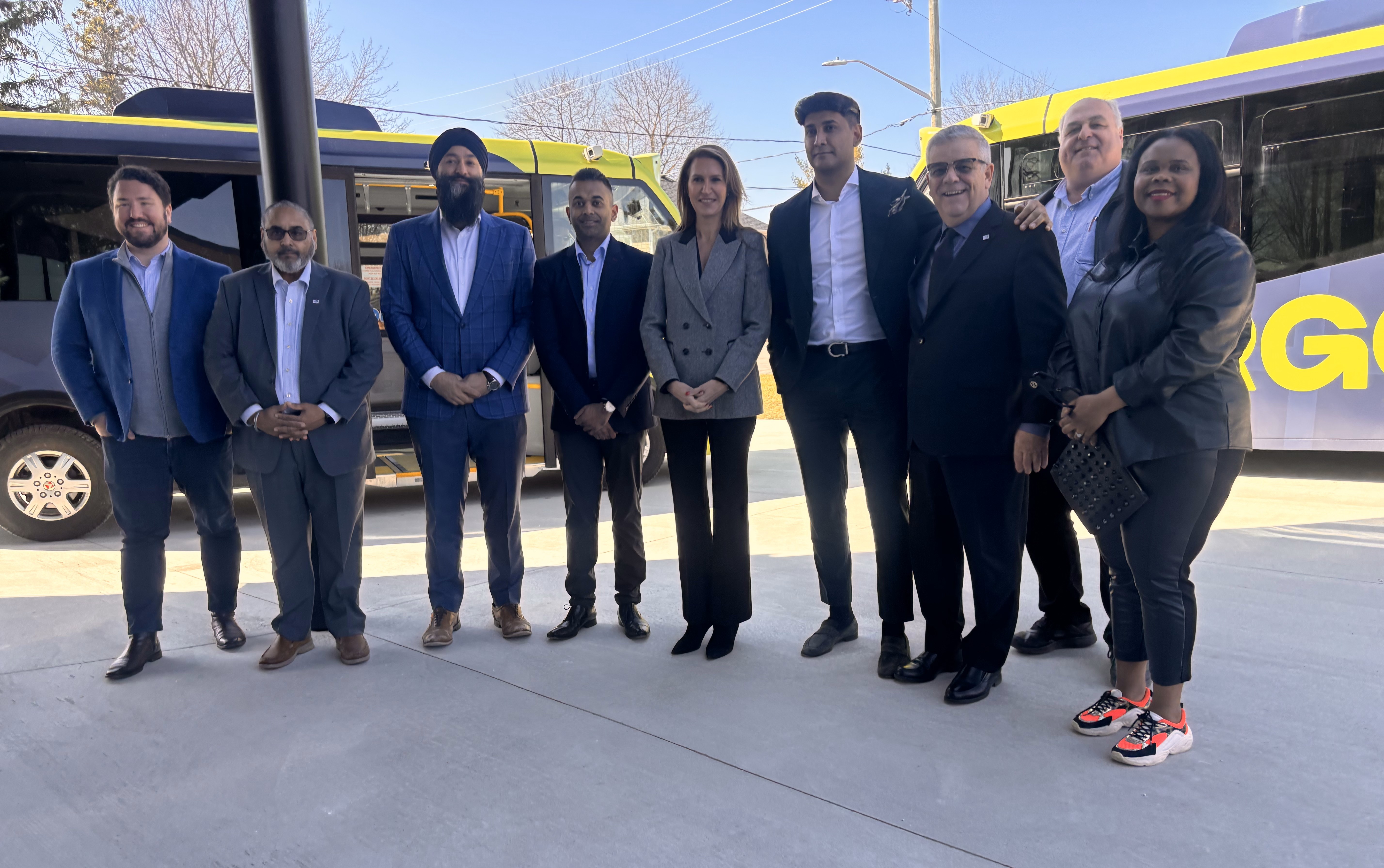 MPP Sarkaria, MPP Mulroney, Members of Argo and BWG Council standing in front of Argo busses MPP Sarkaria, MPP Mulroney, Members of Argo and BWG Council standing in front of Argo busses